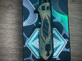 Heretic Knives Jinn Manual Button Lock (Gold & Green Cel Shade Carbon Breach)