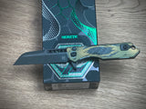 Heretic Knives Jinn Manual Button Lock (Gold & Green Cel Shade Carbon Breach)