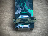 Heretic Knives Jinn Manual Button Lock (Gold & Green Cel Shade Carbon Breach)