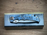 Spartan Blades Harsey Folder ''Plague Doctor'' Blue Titanium, Satin MagnaCut by William W. Harsey (SF5DOCTOR BL)